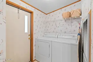 7203 Banner Street SW, Ocean Isle Beach, NC 28469 — 3-bedroom manufactured home in Seaside Heights, Ocean Isle Beach, NC, photo 22 of 38: Laundry Area