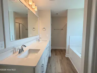 511 Country Club Villa Drive, Shallotte, NC 28470 – photo 13: 511 Country Club Primary Suite Bath