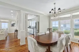 125 Roosevelt Drive, Pine Knoll Shores, NC 28512 — 5-bedroom home in Roosevelt Beach, Pine Knoll Shores, NC, photo 5 of 61: Formal dining room