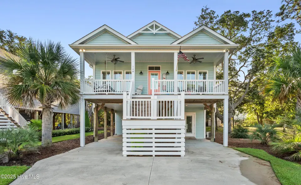 148 NW 4th Street, Oak Island, NC 28465 – photo 1 of 68: 148 NW 4th St
