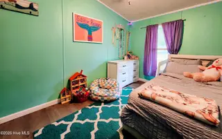 623 Sandy Bluff Drive SW, Supply, NC 28462 — 3-bedroom manufactured home in Sandy Bluff, Supply, NC, photo 12 of 26: Guest Bedroom 1