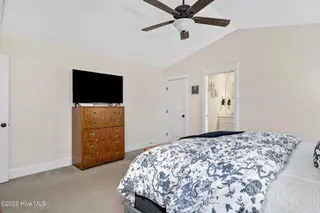 19 Darel Street, Rocky Point, NC 28457 – photo 16: Primary view to walk-in closet and bath.