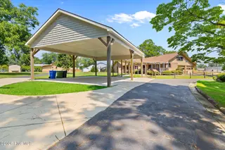 303 N Lincoln Street, Benson, NC 27504 – photo 10: Covered Carport