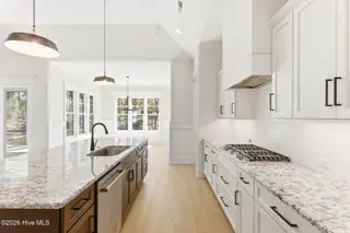 1943 Redfish SW, Supply, NC 28462 — 4-bedroom home in Oyster Harbour, Supply, NC, photo 17 of 42: Kitchen