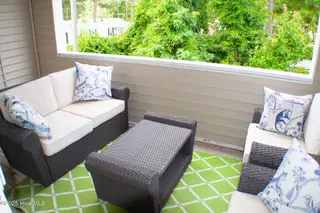 413 Commerce Avenue Unit D, Morehead City, NC 28557 – photo 12: Covered back porch