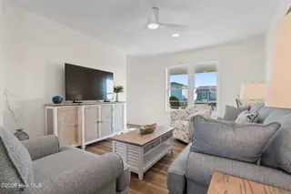 1116 E Beach Drive, Oak Island, NC 28465 – photo 10: Living