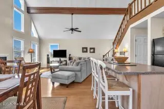 6707 Kings Lynn Drive, Oak Island, NC 28465 – photo 13: 6707 bar