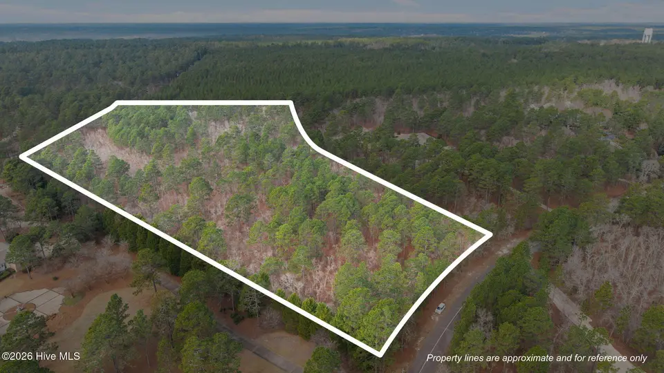 825 Lake Dornoch Drive, Pinehurst, NC 28374 – photo 1 of 16: 32-web-or-mls-DJI_20260310095312_0180_D_