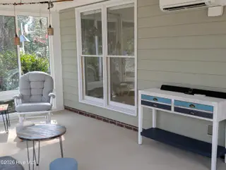 6641 Shire Lane, Wilmington, NC 28411 – photo 14: sunroom with HVAC