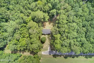728 Warrior Trail, Whiteville, NC 28472 – photo 3: Surrounded By Trees!