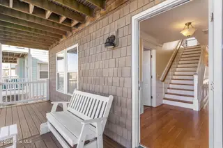 390 E Second Street, Ocean Isle Beach, NC 28469 – photo 17: Glider on front porch