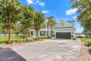 2625 Seashore Road SW, Supply, NC 28462 — 5-bedroom home in Pelican Point, Supply, NC, photo 8 of 62: Exterior Front