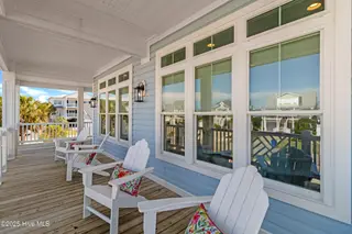 3604 W Pelican Drive, Oak Island, NC 28465 – photo 6: Front Covered Porch