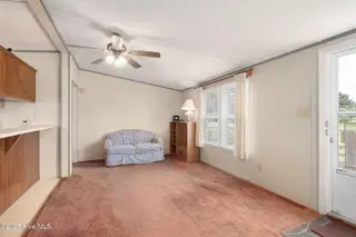 100 Lindsey Court, Beaufort, NC 28516 — 3-bedroom manufactured home in Green Meadows, Beaufort, NC, photo 8 of 38: Entry into Living Room