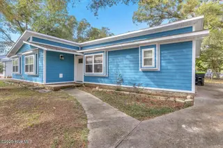 209 NE 56th Street, Oak Island, NC 28465 – photo 3: 04-Final 209 NE 56th St OKI-RJREM-9371