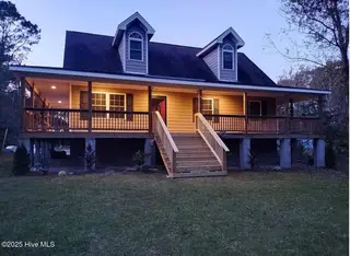 3016 Dillon Way NE, Leland, NC 28451 — 3-bedroom home, Leland, NC, photo 2 of 17: Front-Night