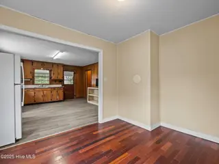 195 Queens Creek Road, Swansboro, NC 28584 — 2-bedroom home, Swansboro, NC, photo 13 of 40: DR to kitchen