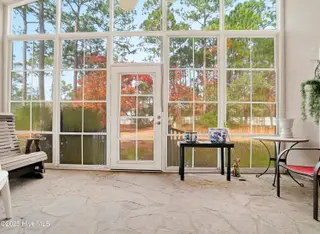 833 Fifty Lakes Drive, Southport, NC 28461 – photo 22: Back Closed in Paatio