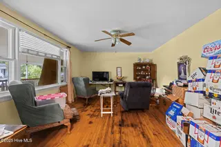 712 Page Drive, Jacksonville, NC 28540 — 4-bedroom home in Northwoods, Jacksonville, NC, photo 5 of 18: Formal Living Room
