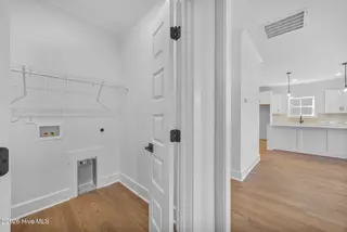 6012 Painted Turtle Place 191, Leland, NC 28451 – photo 23: 21_laundry