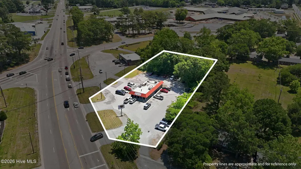 1115 John Small Avenue, Washington, NC 27889 – photo 1 of 34: 11-web-or-mls-DJI_20260517130326_0665_D