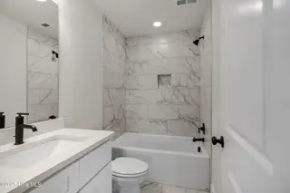 208 Triton Lane, Surf City, NC 28445 – photo 21: Hall Bath EXAMPLE