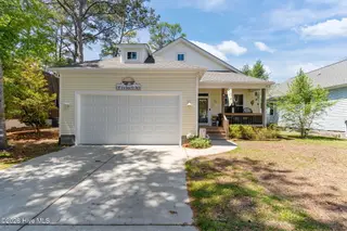 161 NE 31st Street, Oak Island, NC 28465 – photo 1: 3-web-or-mls-DSC04229