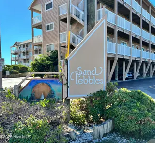 1101 Lake Park Boulevard S C2, Carolina Beach, NC 28428 — 2-bedroom condo in Sand Pebbles Condominium, Carolina Beach, NC, photo 1 of 7: IMG_1940