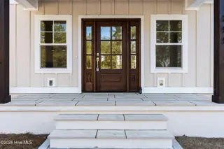 355 S Middleton Drive NW, Calabash, NC 28467 – photo 10: Mahogony Front Door with Tile Floor!