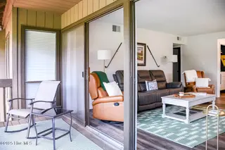800 Saint Andrews Drive # 232, Pinehurst, NC 28374 – photo 12: Loblolly Living Room- Deck