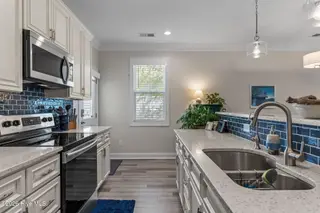 161 NE 31st Street, Oak Island, NC 28465 – photo 17: 22-web-or-mls-DSC04145