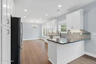 202 NE 33rd Street, Oak Island, NC 28465 – photo 6: 15-web-or-mls-cammediallc.com-30