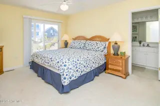 1131 S Shore Drive, Surf City, NC 28445 – photo 15: Streetside North King Bedroom