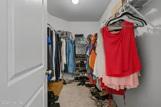 737 Landmark Cove, Carolina Shores, NC 28467 — 4-bedroom home in Landmark at Lighthouse Cove, Carolina Shores, NC, photo 22 of 39: Owners Walk-In Closet