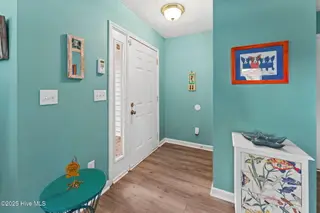 124 NW 8th Street, Oak Island, NC 28465 — 3-bedroom home in Pinners Point, Oak Island, NC, photo 3 of 47: shniderproductions.com-22