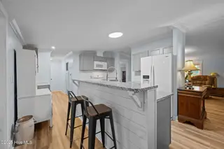166 Watts Landing Road, Hampstead, NC 28443 – photo 10: Kitchen and Breakfast Bar