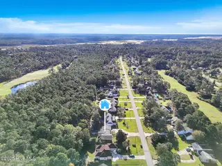 60 Country Club Drive, Shallotte, NC 28470 – photo 5: 61-Final Drone 60 Country Club Dr Shallo