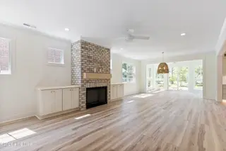 387 Blossom Tree Lane SE, Bolivia, NC 28422 – photo 7: livingroom sunroom