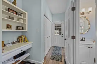504 Blackledge Circle, Trent Woods, NC 28562 – photo 16: Hallway to Garage and Bonus Rm
