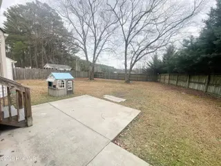 406 Hawthorne Lane W, Wilson, NC 27893 – photo 13: Backyard