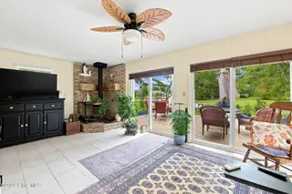 1210 Pelican Drive, New Bern, NC 28560 – photo 10: wood stove in sunroom