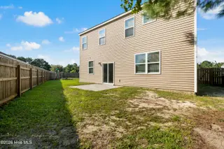 1699 Datchet Lane SE, Bolivia, NC 28422 — 4-bedroom home in New South Bridge, Bolivia, NC, photo 19 of 40: Back of home