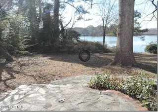 2856a Forest Hills Loop SW, Wilson, NC 27893 – photo 16: 16 _ Lake View _ Stone Patio_Path