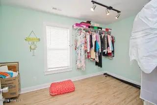 307 Anita Forte Drive, Cape Carteret, NC 28584 – photo 23: 1/2 of the master closet!