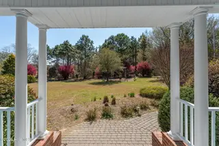2689 Sloop Point Loop Road, Hampstead, NC 28443 – photo 12: front-porch-01e