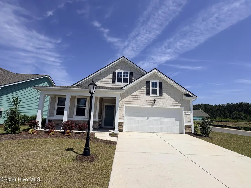 1245 Woodhouse Drive NW, Ash, NC 28420 – photo 1 of 31: Lot 36 1245 Woodhouse Drive NW