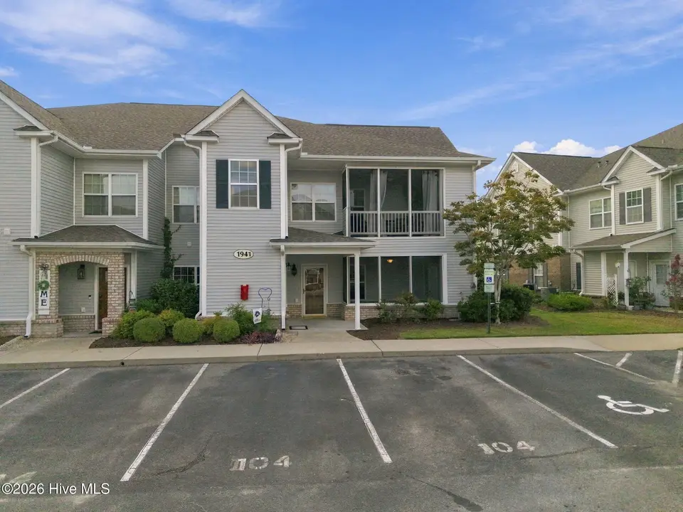 1941 Tara Court 104, Greenville, NC 27858 – photo 1 of 41: 1-web-or-mls-DJI_20260921161807_0039_D