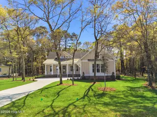 1943 Redfish SW, Supply, NC 28462 — 4-bedroom home in Oyster Harbour, Supply, NC, photo 1 of 42: Front Exterior