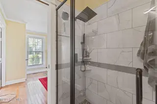 128 E Railroad Street, La Grange, NC 28551 – photo 9: jack and jill walk in tile shower