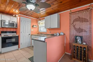 4107 E Oak Island Drive, Oak Island, NC 28465 – photo 15: 21-web-or-mls-DSC06282